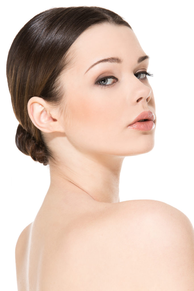 Cute, attractive woman on a white background